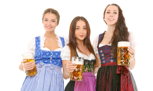 Waitresses at Oktoberfest Holding Beers Waitresses at Oktoberfest Holding Beers